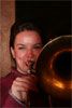 Lucilla admires Woolfy's work on the shiny trombone