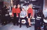 Surrounded by three beautiful women, Rob could only think of grabbing his helmet!
