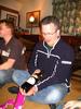 Joe wins the bottle of wine he'd bought earlier