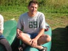 Pete cross-legged... canoeing